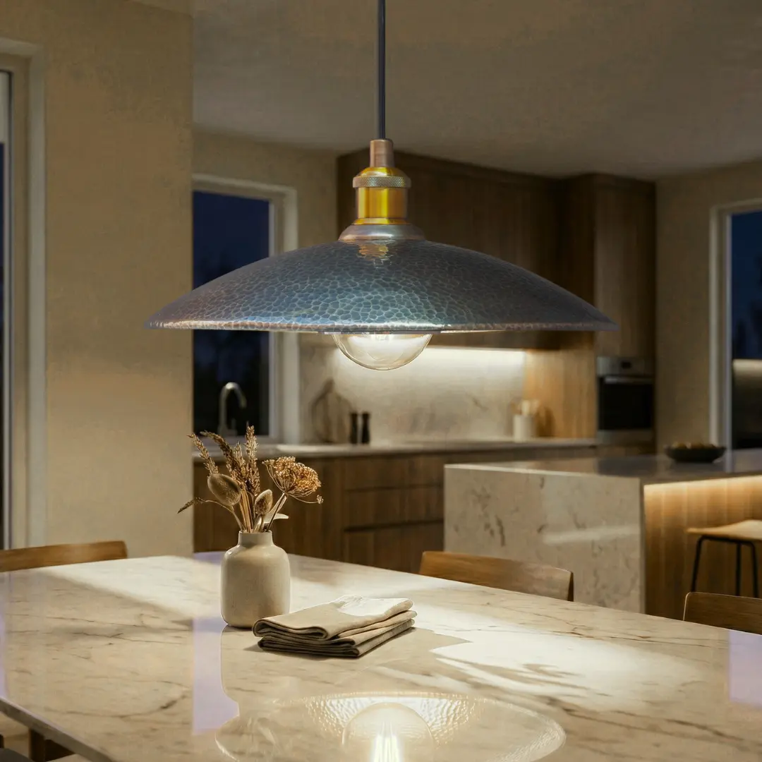 A stunning modern brass chandelier with multiple smoked glass globes hangs above a contemporary dining table