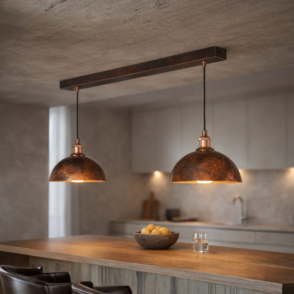 Luxury brass island lighting in a modern kitchen with marble countertops
